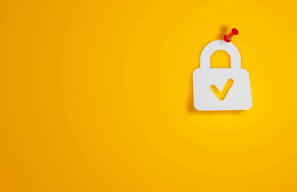 Pin Paper Padlock Symbol on Yellow Background in reference to Quebec's Law 25
