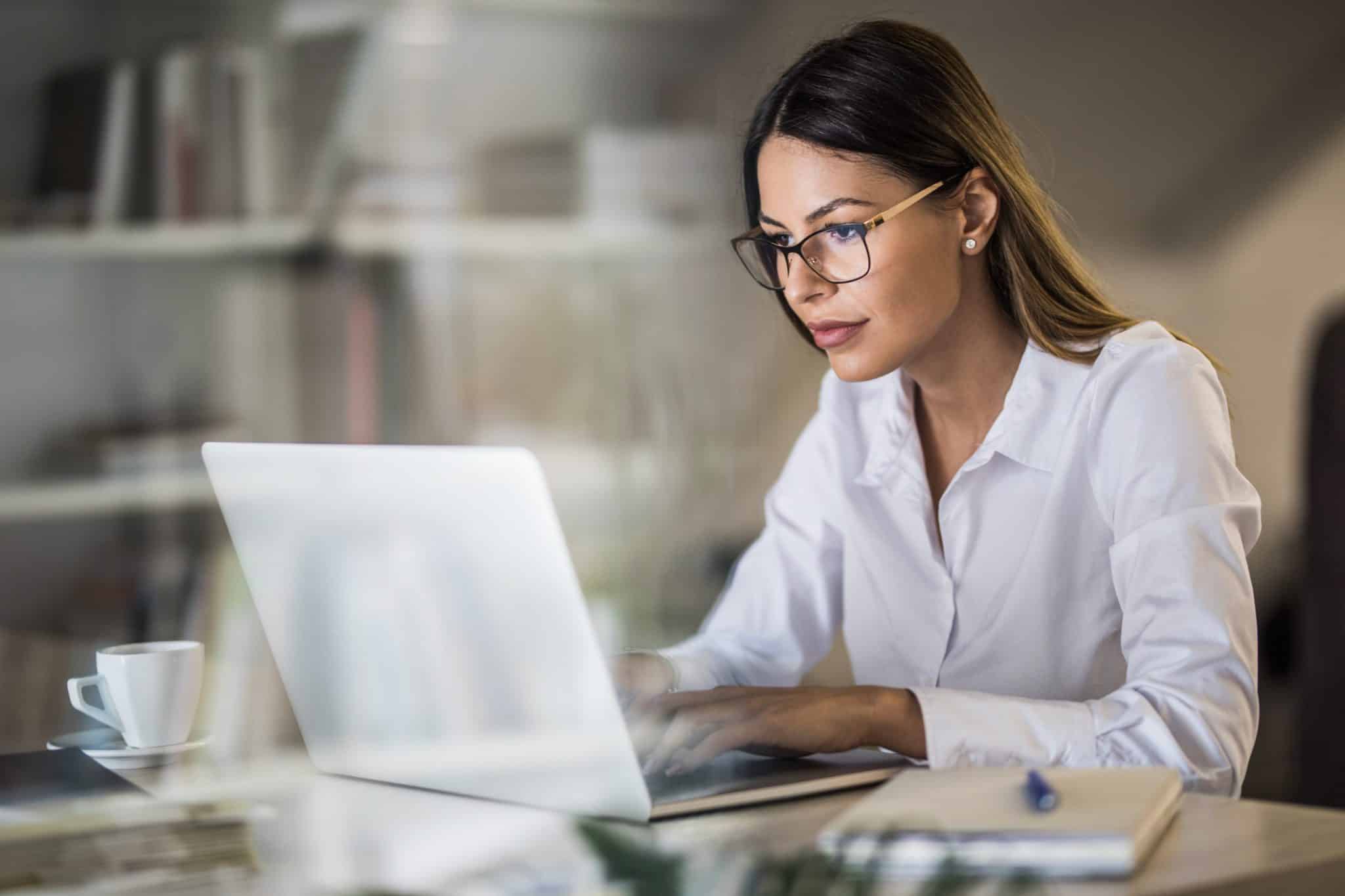 Young businesswoman working on a laptop