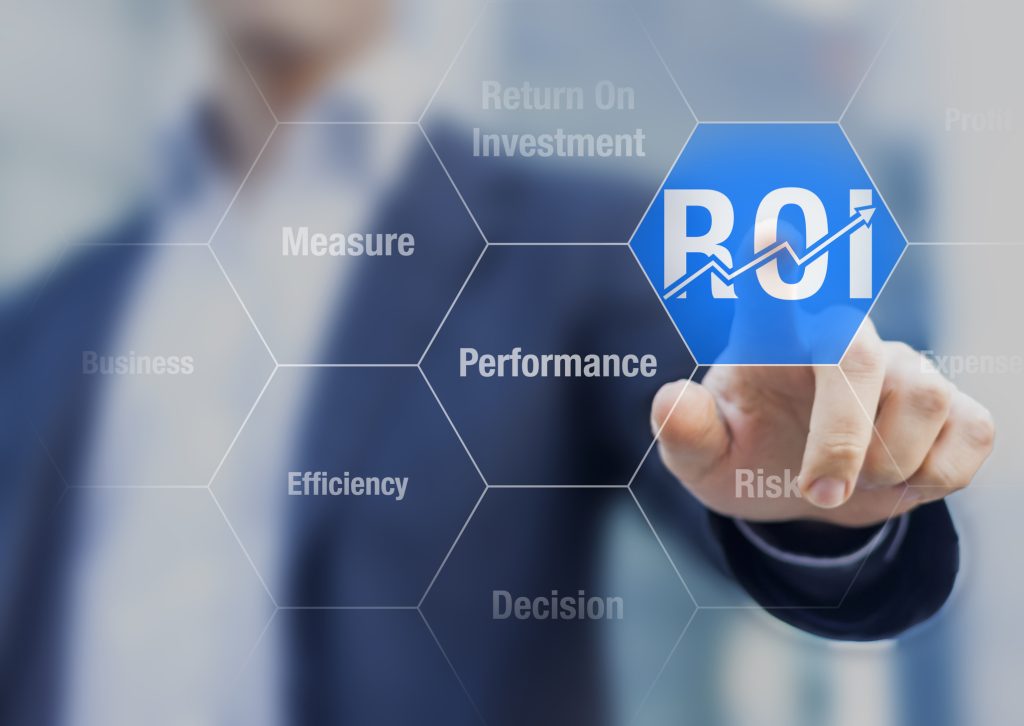 Businessman using ROI indicator for improving business performance