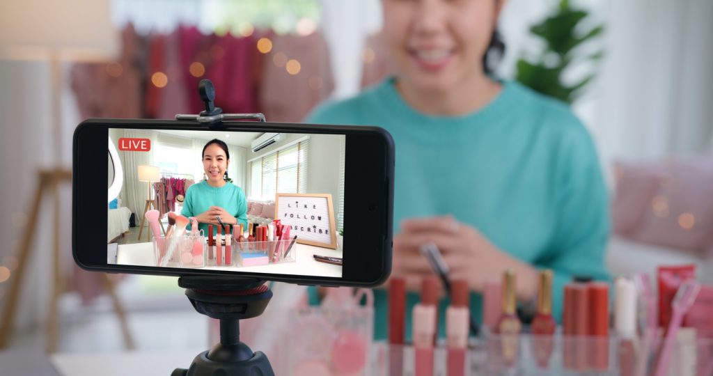 Influencer recording live video in home studio, a new digital marketing trend for 2023