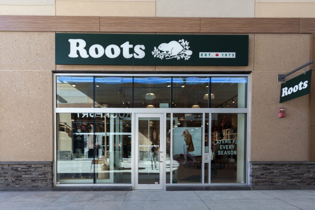 Roots brand storefront in an outlet mall in Niagara, Ontario.