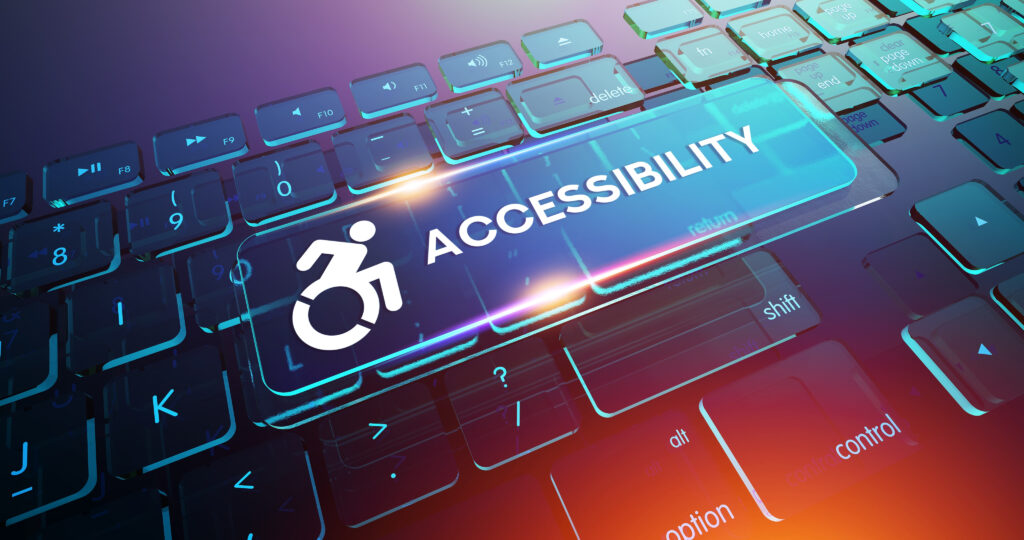 Image of keyboard with a wheelchair and the word “accessibility” highlighted depicting accessible design.